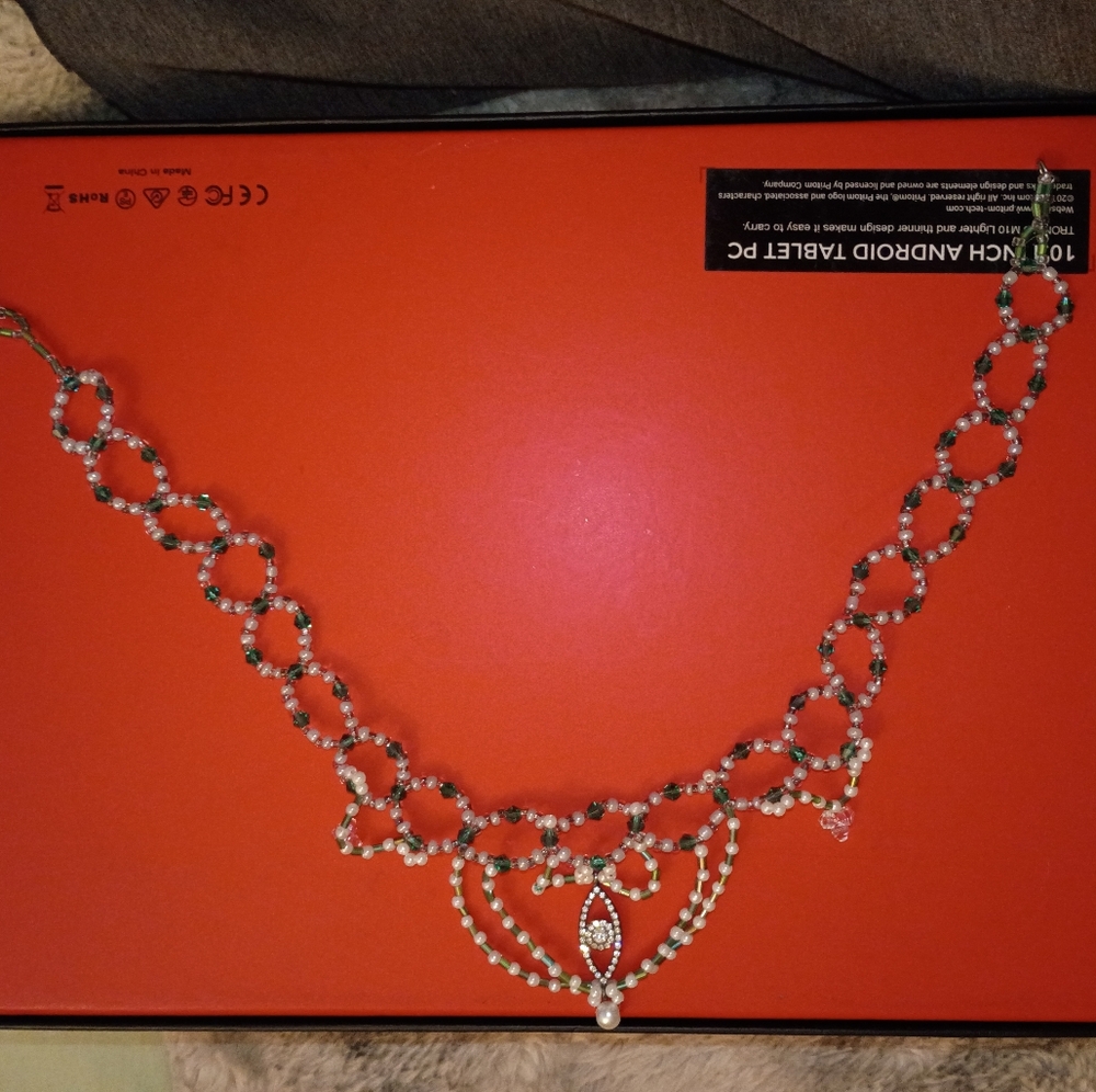 Handmade beaded necklace with evil eye protection